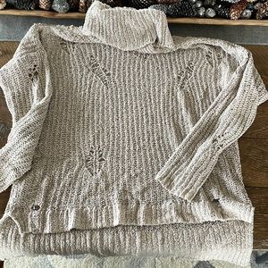 Distressed tunic sweater